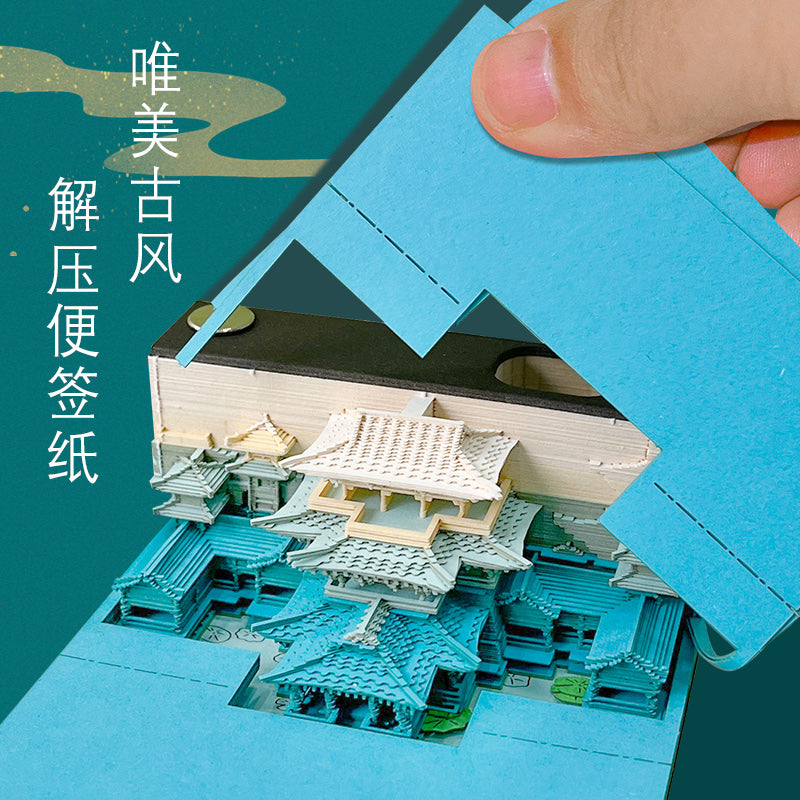 Tear-away page revealing heavenly palace scene on eco-friendly memo pad