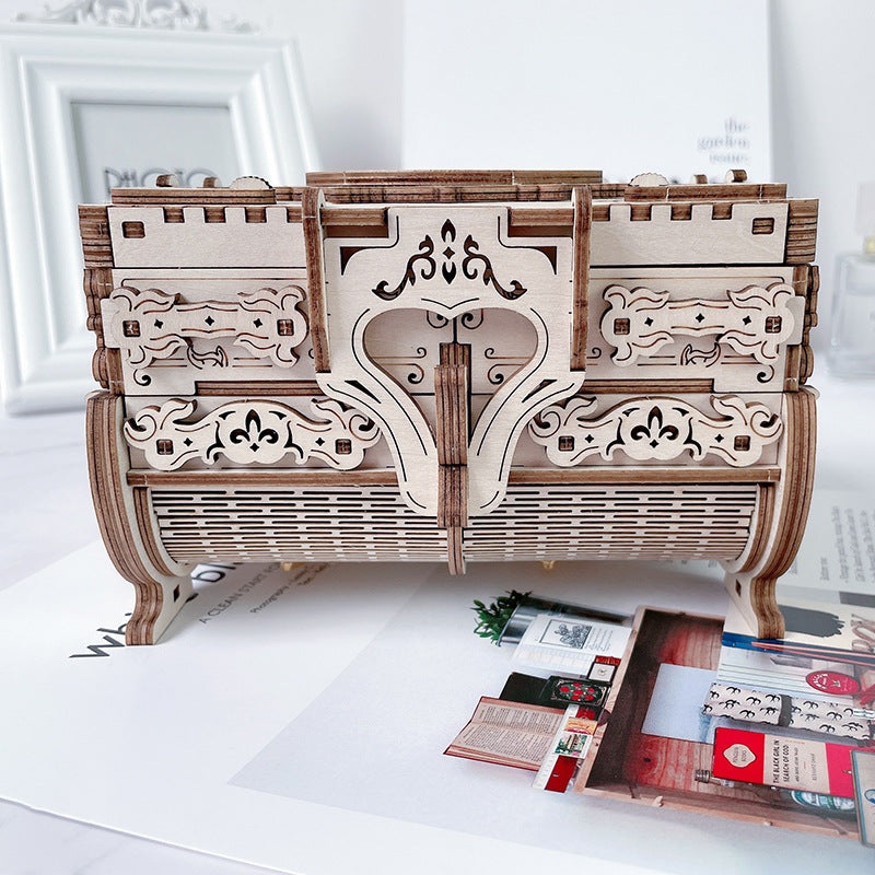 Antique music jewelry box styled on desk – collectible ornament scene
