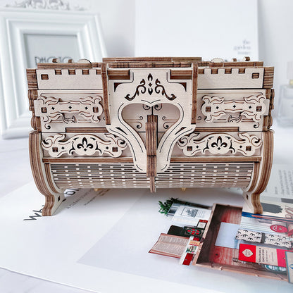 Antique music jewelry box styled on desk – collectible ornament scene
