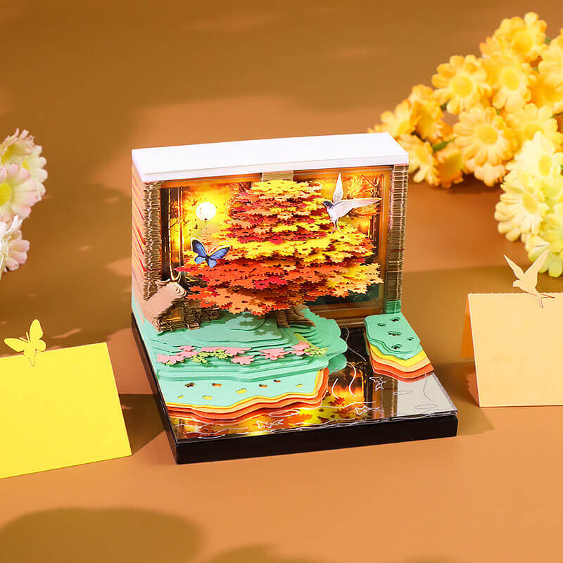 Close-up of Phoenix Parasol Tree 3D memo pad pages with weekly planner layout