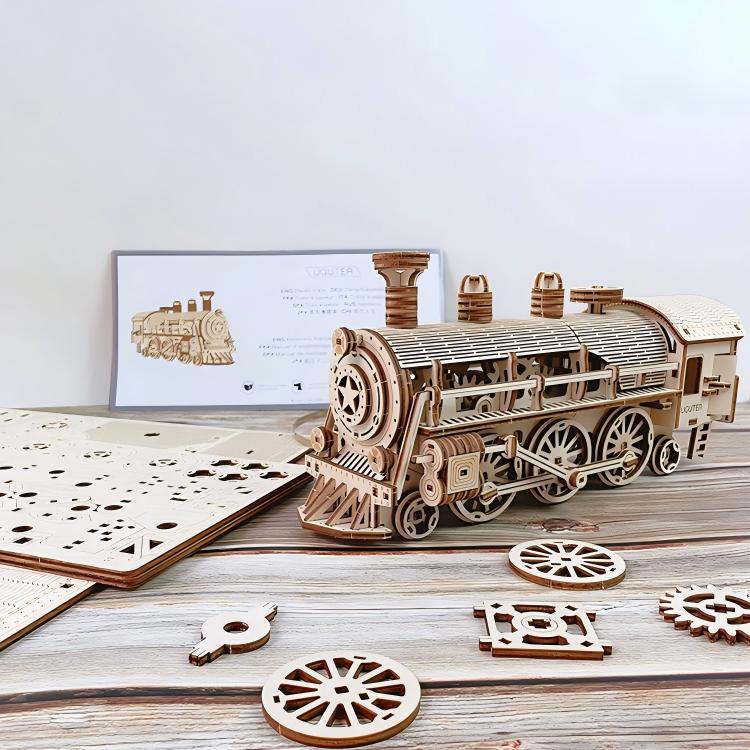 Wooden steam train kit – close-up detail of clockwork mechanism