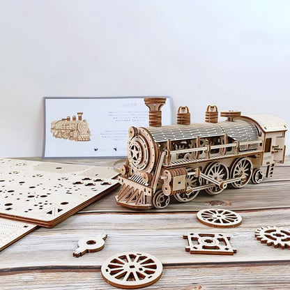 Wooden steam train kit – close-up detail of clockwork mechanism