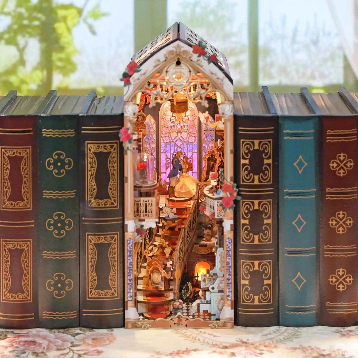 Miniature house made from books with decorative interior